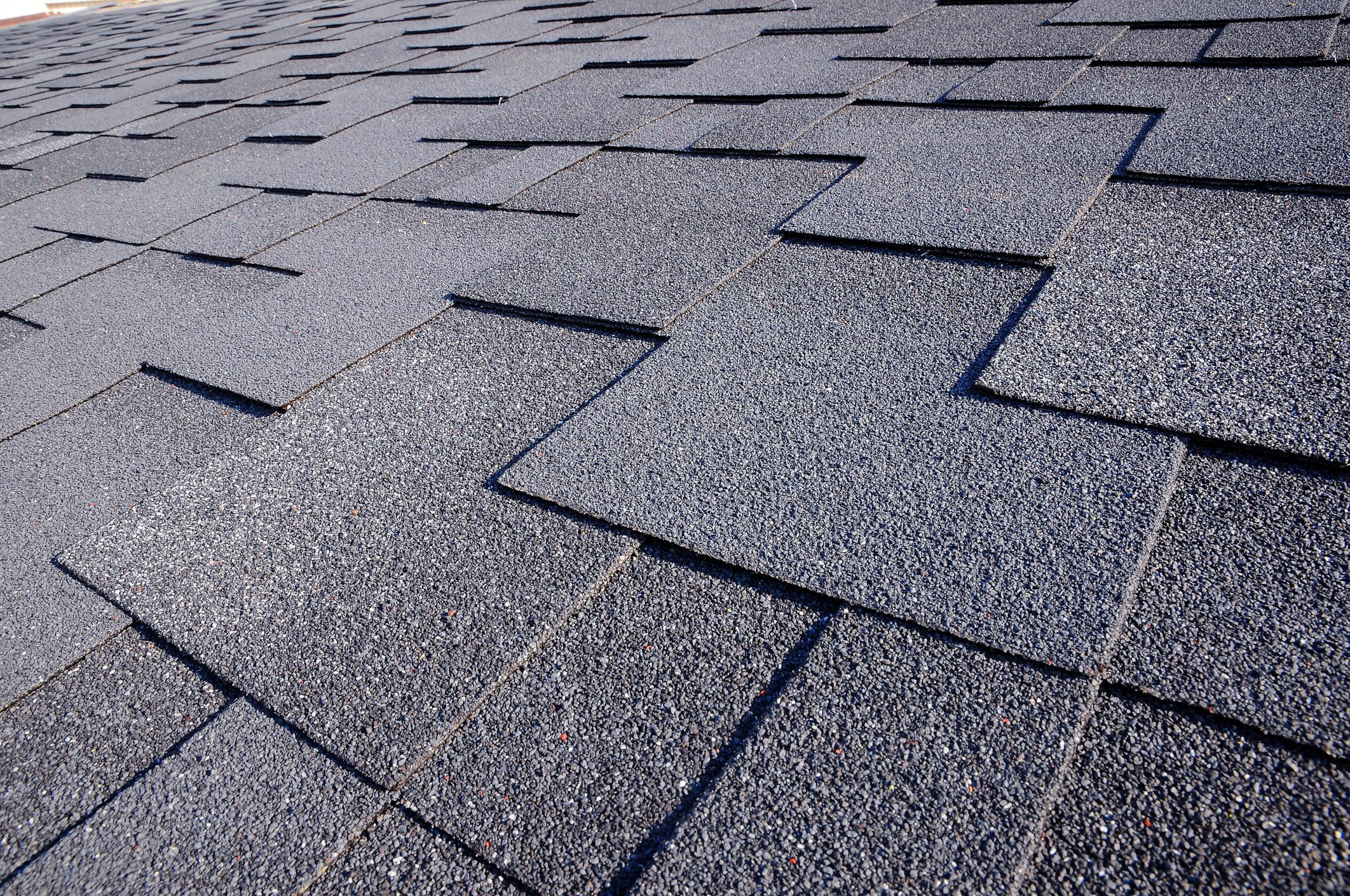 Close up view on asphalt roofing shingles